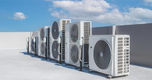 Commercial HVAC units on rooftop in San Antonio, maintained and installed by Sandoval Cooling Inc., specialists in commercial HVAC and refrigeration systems.